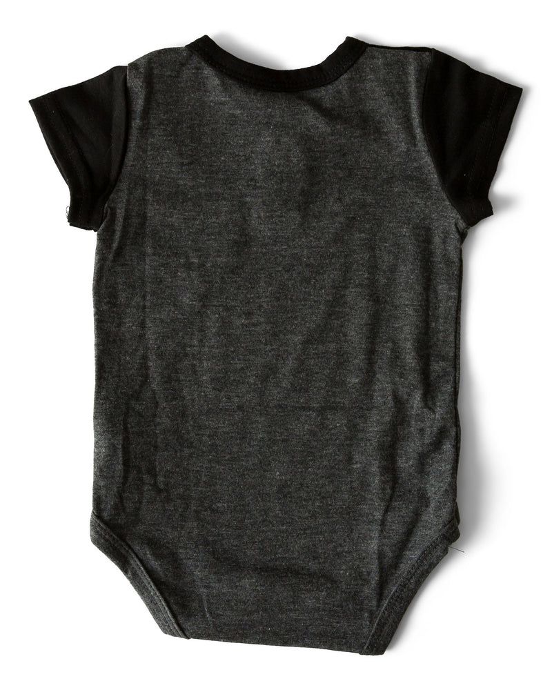 The Littlest Prince Black & Charcoal Block Henley Shirt is for the fashionable little gentleman who likes to take casual up a notch. This cool t-shirt is super comfy and can even be worn under a nice sports jacket with jeans. This set is perfect for stylish brothers as well as for matching daddy!