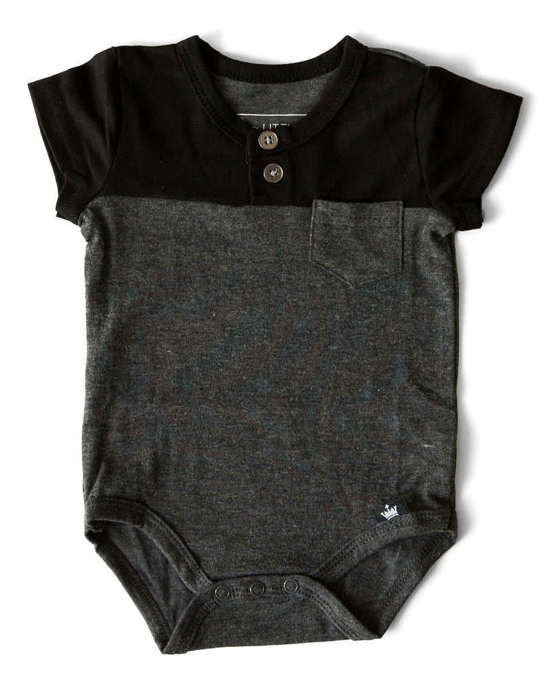 The Littlest Prince Black & Charcoal Block Henley Shirt is for the fashionable little gentleman who likes to take casual up a notch. This cool t-shirt is super comfy and can even be worn under a nice sports jacket with jeans. This set is perfect for stylish brothers as well as for matching daddy!