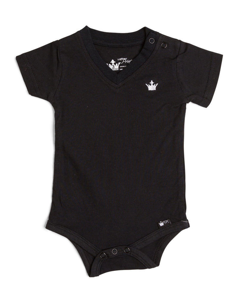 The Littlest Prince Black Crown Logo Tee is sleek and simple which allows you to style it how you please! You can dress it up with a sports jacket or keep it cool with a pair of jeans. It is a v-neck style which keeps your little man totally stylish. Available in baby, toddler and tween sizes!