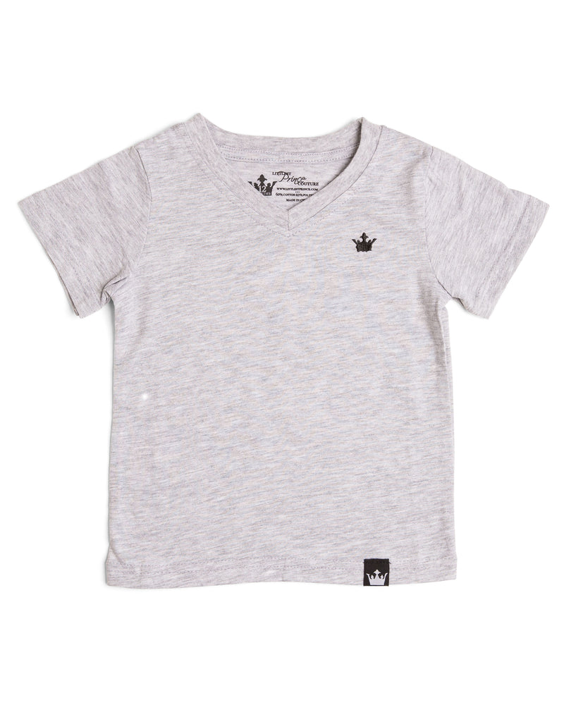 The Littlest Prince Gray Crown Logo Tee is sleek and simple which allows you to style it how you please! You can dress it up with a sports jacket or keep it cool with a pair of jeans. It is a v-neck style which keeps your little man totally stylish. Available in baby, toddler and tween sizes!