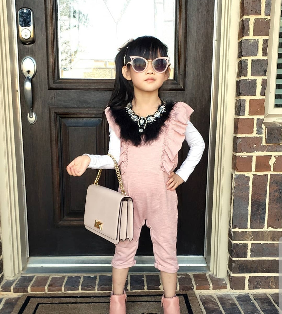 Calling all Boujie Diva's! Our crystal feather necklaces are the perfect addition for our mini diva's all the way up to our mama diva's. Each necklace sits high on top of your existing shirt and is lined with colorful feathers and shining crystals.  Mix and match with your mini for the perfect stylish accessory!  Available in beige, black, red and blue